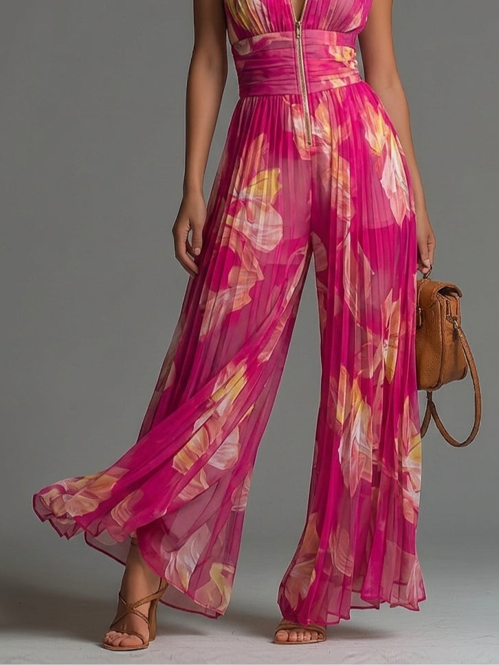 Gerda | Ærmeløs buksedragt i plisseret chiffon med fuchsia blomsterprint