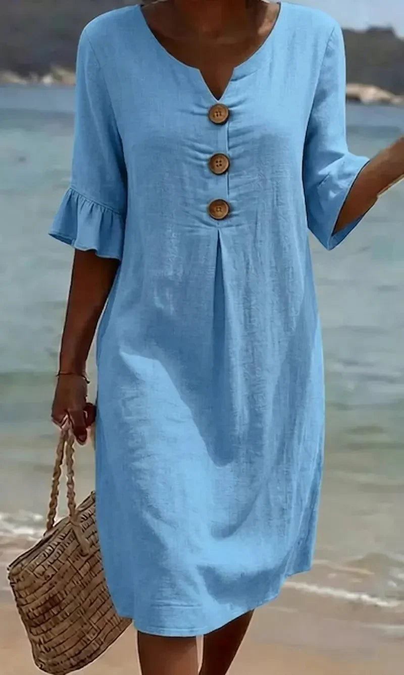 Lilian | Knappet kjole i høroptik med pufærmer