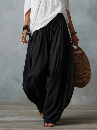 Sæt med Hvid Off-Shoulder Top og Vide Bukser