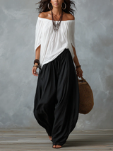 Sæt med Hvid Off-Shoulder Top og Vide Bukser